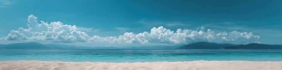 Obraz premium Tranquil tropical beach with clear blue sky and ocean horizon