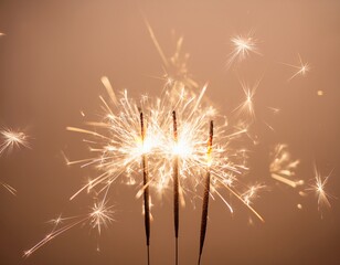 sparklers on beige background with soft light