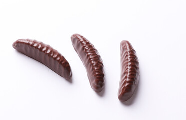 Chocolate candies on white background. Top view