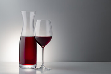 Red wine glass and bootle with shadow on withe background