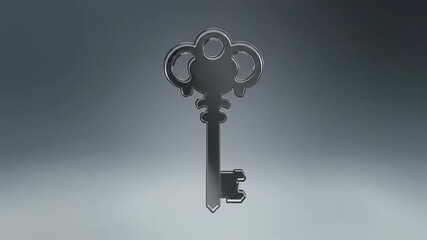 Antique keys rotating on neutral background