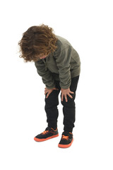 bent over Child standing bent over looking down on white background
