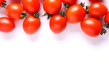 Ripe cherry tomatoes on a white background. Copy space