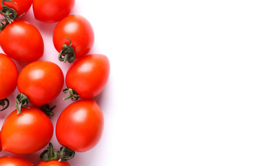 Ripe cherry tomatoes on a white background. Copy space