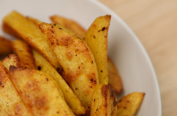 Fried potatoes peasant style on a plate