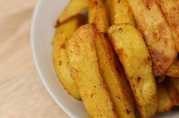 Fried potatoes peasant style on a plate