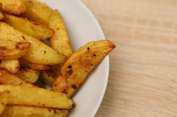 Fried potatoes peasant style on a plate