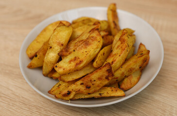 Fried potatoes peasant style on a plate