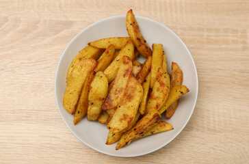 Fried potatoes peasant style on a plate