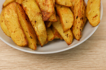 Fried potatoes peasant style on a plate