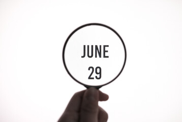 Date June 29 through the magnifying glass on the screen