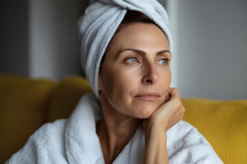 Calm reflection of a mature adult woman