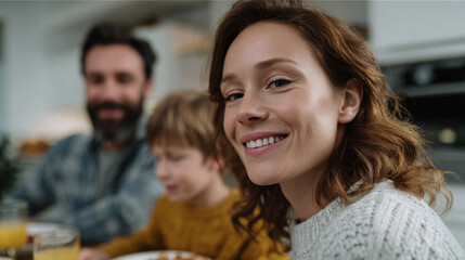 Cheerful family having breakfast together.