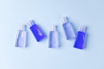 Antiseptic bottles on a blue background