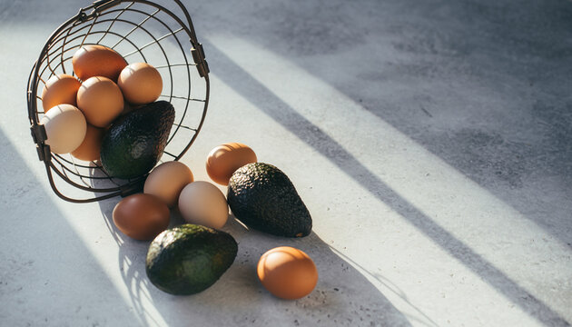 Farm Fresh Eggs and Avocados on Concrete with Natural Light - Powered by Adobe