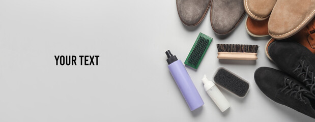 Suede shoes with Shoe care products and accessories on gray background. Flat lay. Copy space for...