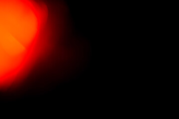 Magnificent large orange-yellow bokeh sphere with warm luminous glow creating three-dimensional...