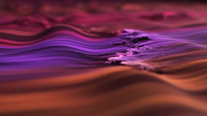 Abstract waves with purple, orange, and red hues in a blurred motion