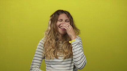 Obraz premium Woman mouth laughing studio blonde young subject wearing striped green watch casual attire.