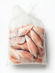 Raw seafood fillets in transparent sealed bag for cooking and storage, white background