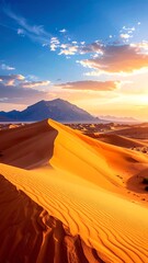 Golden Hour in the Desert - Sand Dunes and Distant Mountains.
