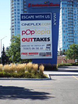  Gloucester, ON, Canada-June 26,2025:A large, blue pylon sign advertising the "Scotiabank Theatre Cineplex Entertainment complex " at 2385 City Park Dr.
