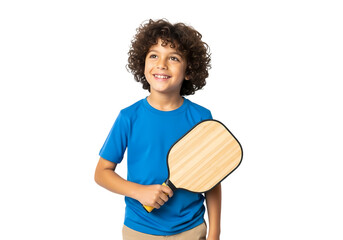 Smiling boy with paddle dreams of ping pong glory