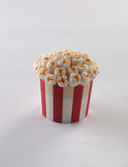 A popcorn-shaped cupcake, a very original children's treat.