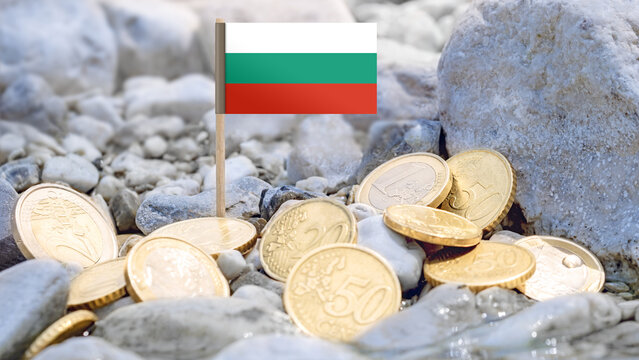 Bulgarian Flag and euro coins on the riverbank,foreign investment,currency exchange,and international finance connected to Bulgaria and the European economy.
