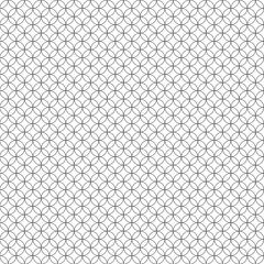 Repeating pattern of overlapping circles creating a tessellated design on a white background surface