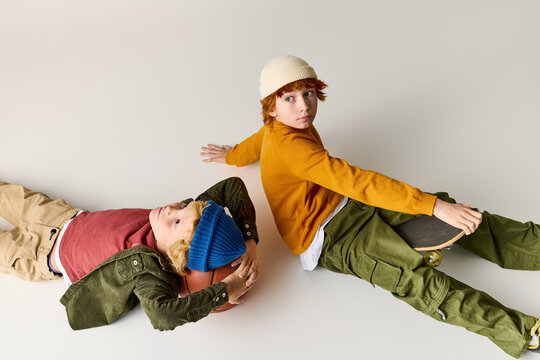 Stylish kids enjoying a playful moment in a creative setting