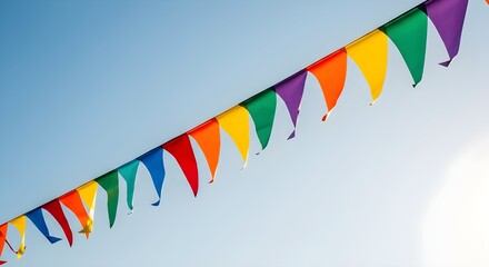 Colorful festival flags on blue sky
