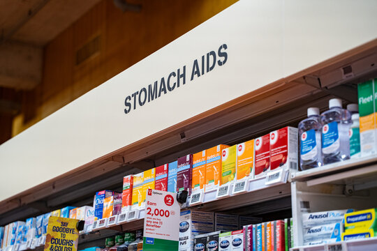 View of stomach aids section and digestive products in pharmacy. Toronto, Canada - November 20, 2025.