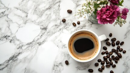 White coffee cup with dark espresso, coffee beans, and pink flowers on a marble surface