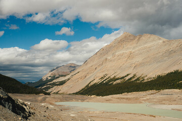Clouds Over a Mountain with Glacier Water Below in Alberta, Canada