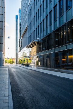 Corporate street architecture in an empty modern urban cityscape through the financial district, showing business focus and future potential in structured design