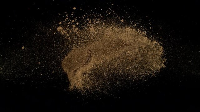 Super Slow Motion of Soil Colliding with Each Other Isolated on Black at 1000fps.