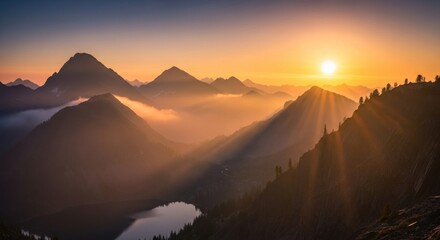 Sunrise over a mountain range with a lake in the foreground, with a dense fog layer in the valley below.