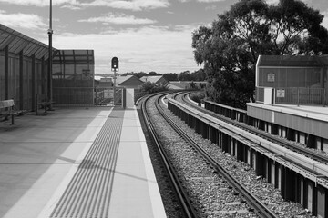 Panoramic view of a railway line in Adelaide, Australia. Black and white photograph.