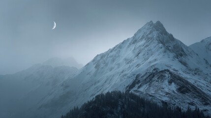 Snowy mountain range under cloudy sky