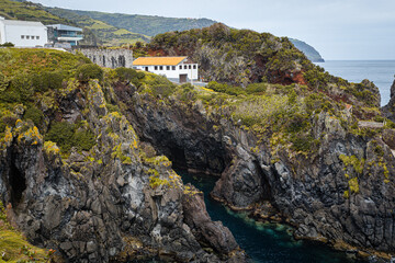 Cliff view of the Fabrica da Baleia do Boqueirao Museum in Santa Cruz das Flores, Azores Portugal