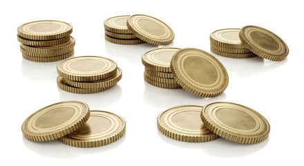 A collection of shiny blank golden coins neatly arranged in multiple stacks and scattered on a surface