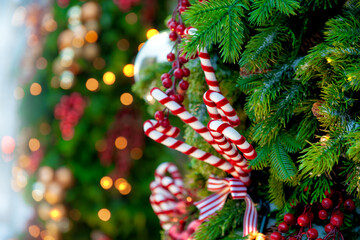 Festive pine tree decoration captured with a cozy, bokeh-filled Christmas background
