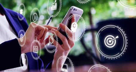 Woman tapping phone and pointing pen showing animated icons for biz research as camera pulling back - Powered by Adobe