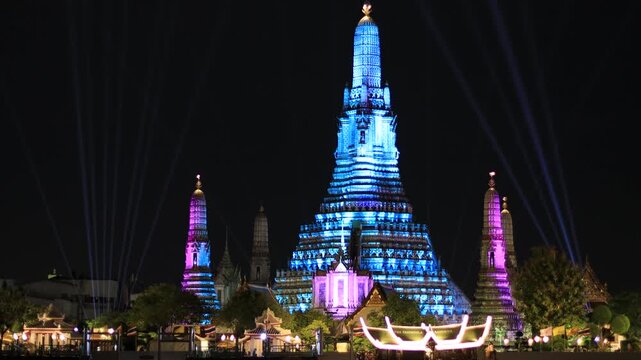 Chao Phraya River Sunset Video Background, see the colorful lights from the spotlights at the 2025 Chao Phraya River Festival, see the beautiful Wat Arun, a world-class tourist attraction.