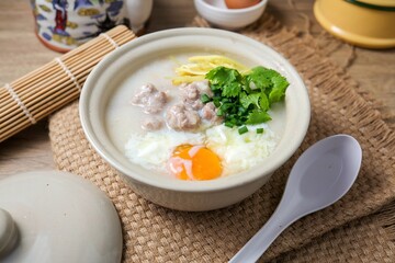 Congee or rice porridge with pork and eggs,thai food, asian food, chinese food	