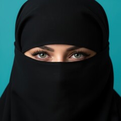 Naklejka premium Beautiful Muslim woman in niqab, the woman eyes covered, black clothes on an Eastern woman, Islam, Ramadan holiday, Eastern people, people from the Caucasus. High quality
