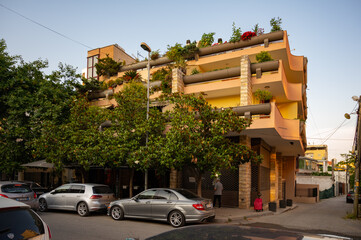 Multi-level house with flowers on balconies Durres, Albania 11.11.2025
