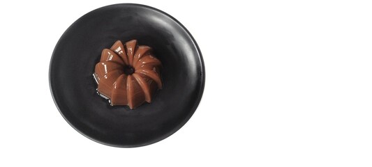 Chocolate Pudding Dessert Dish on a Black Plate. Food Photography Presentation. Isolated on White Background