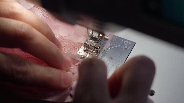 Sewing lace project at home during the day, creating beautiful fabric with needle and thread